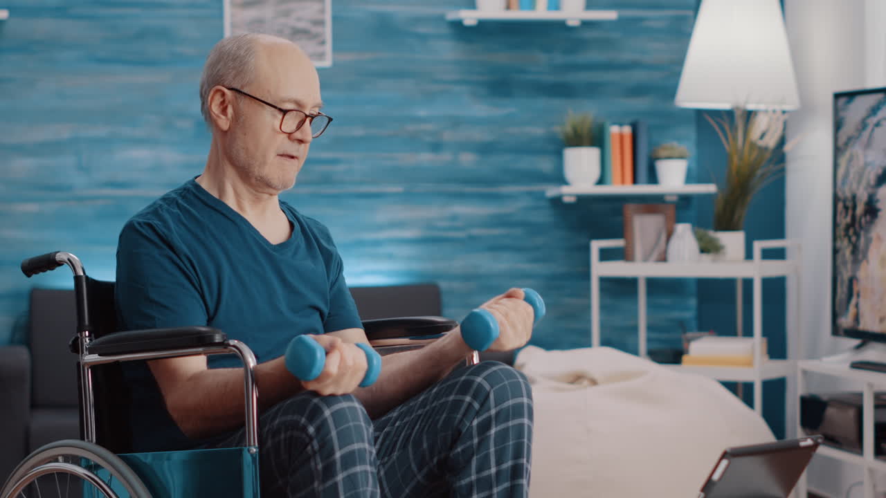 Aged man sitting in wheelchair and lifting weights