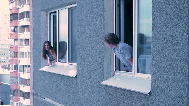 People Talking Through Windows