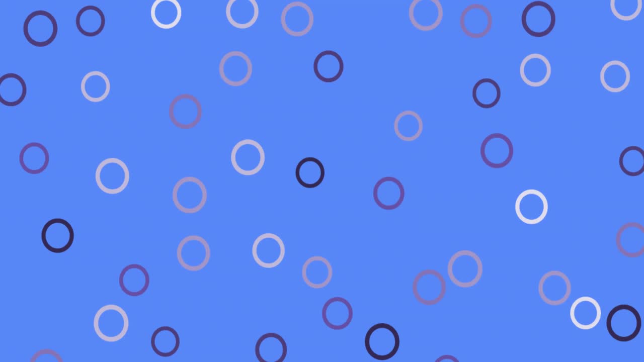 Digital animation of multiple grey circular shapes against blue background