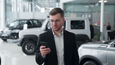 handsome young man quickly receives cash