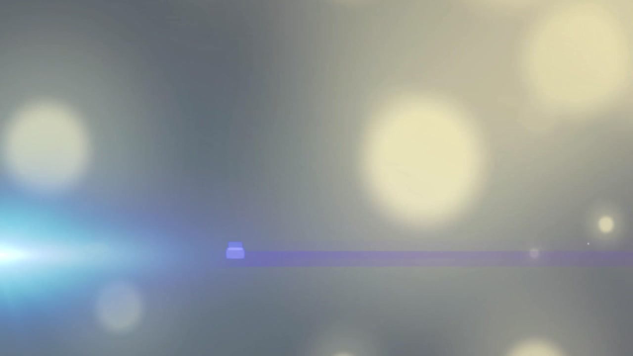 회색에 보케 빛 반점 위에 렌즈 플레어와 함께 파란 스포트라이트의 애니메이션