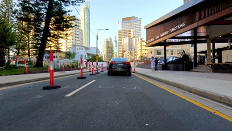 traffic navigates through construction zone in city area