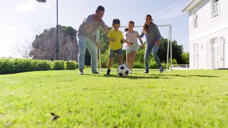 happy family playing football