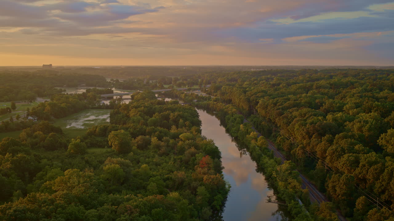 Summertime drone footage with a slow flight above the Huron River in Ann Arbor, Michigan.