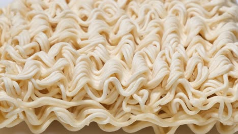 instant pasta rotates in a circle raw macaroni top view instant pasta rotates in a circle raw macaroni top view up close