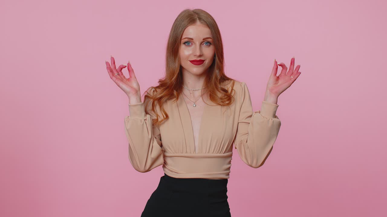 Stylish girl breathes deeply with mudra gesture meditating with concentrated thoughts peaceful mind