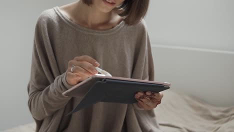 woman using tablet for digital art