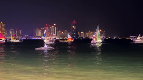 Doha's-luxury-towers,-World-Cup-yachts-and-an-old-Arab-man-in-a-native-boat-on-the-Cornish-coast