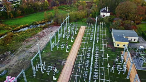 Aerial-View-Of-High-Voltage-Electricity-Distribution-Substation-In-Daytime