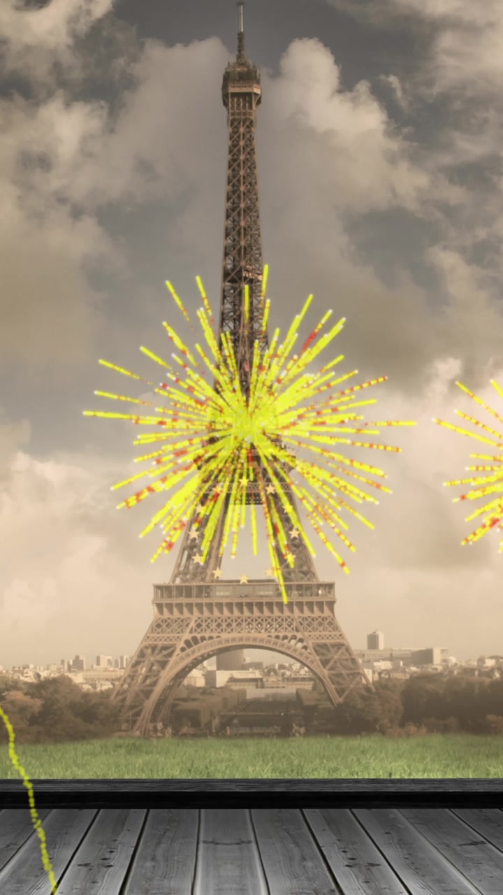 Animazione di fuochi d'artificio gialli sul paesaggio urbano di Parigi con fiume