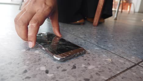 broken phone on the floor