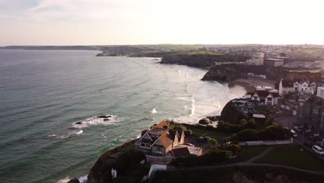 sunrise high aerial shot of newquay beach, cornwall, england, uk