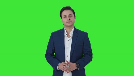 Indian-businessman-looking-at-the-camera-Green-screen