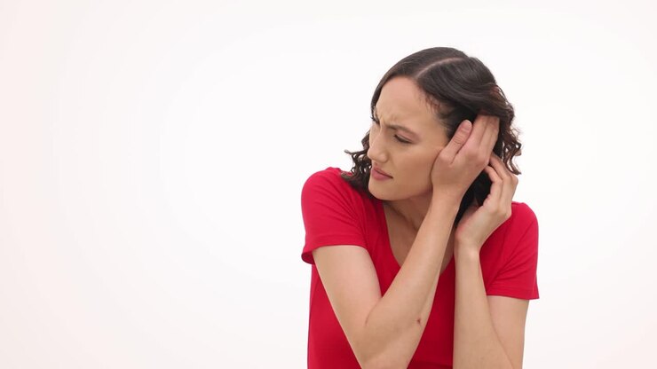 Woman with ear pain