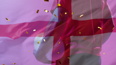 animación de confeti y bandera de inglaterra sobre jugador de rugby afroamericano