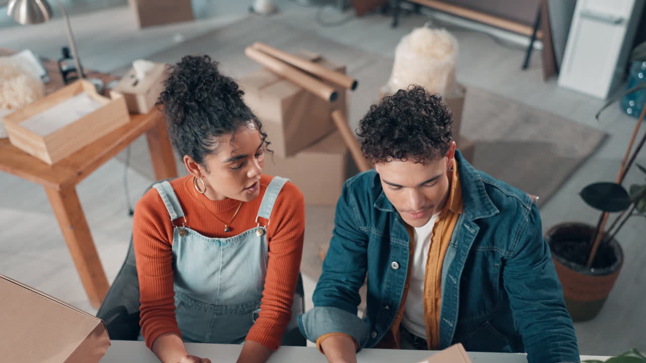 Couple Packing Boxes for Move or Online Business