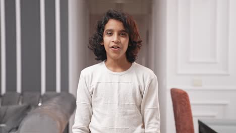 small indian kid youtuber making a video for social media