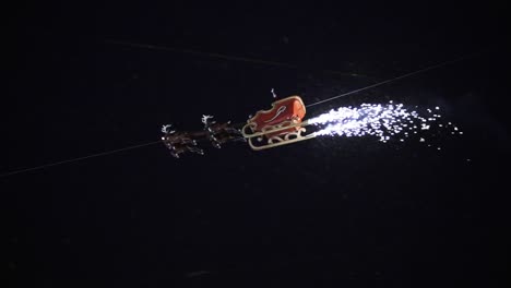 santa claus flying over a christmas market with firework at a snowy night in kassel