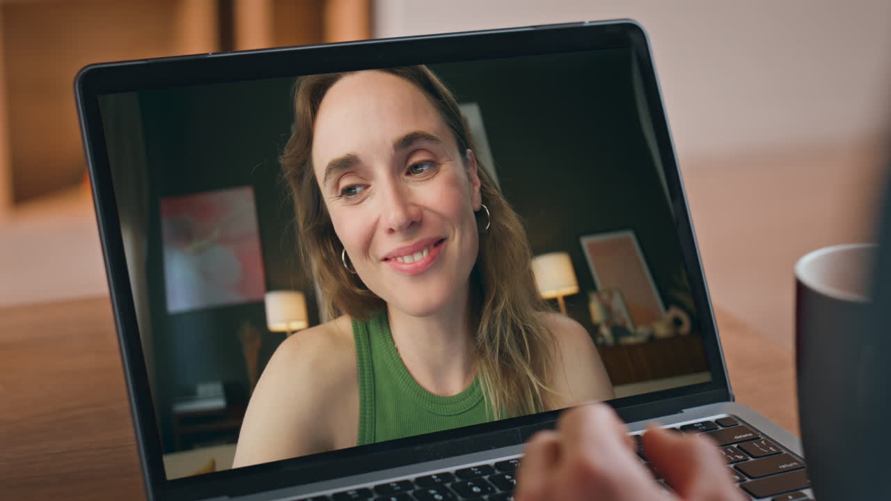 Woman on Video Call Using Laptop