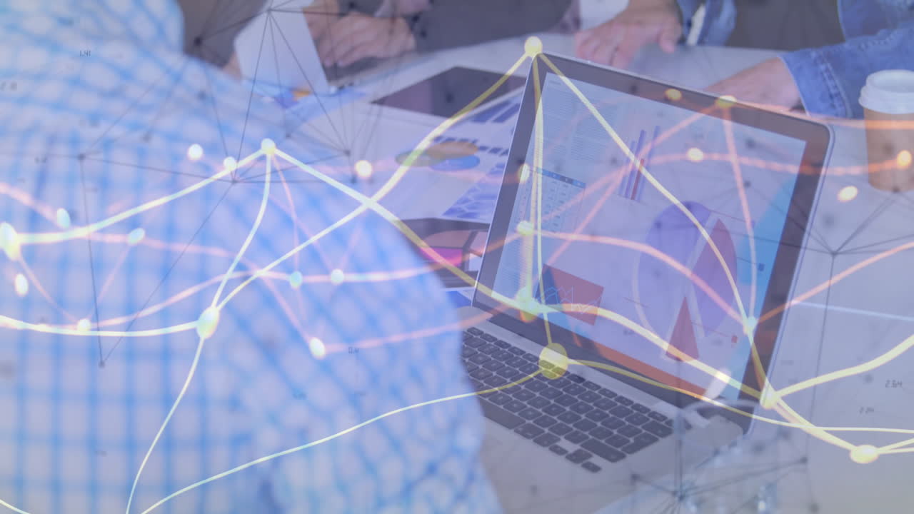Business meeting with data charts on laptop over network connections animation
