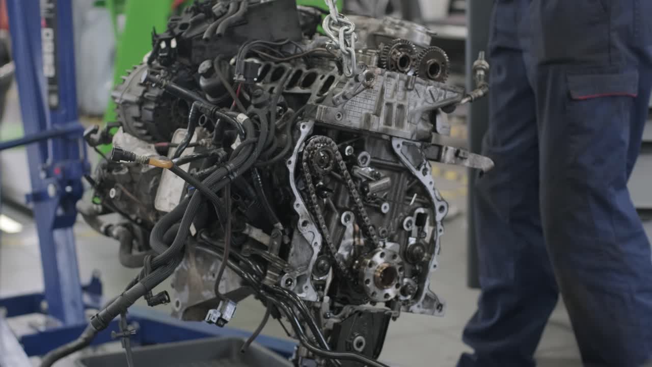Disassembled Car Engine in a Workshop