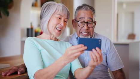 Senior-man,-woman-and-smartphone-in-video-call