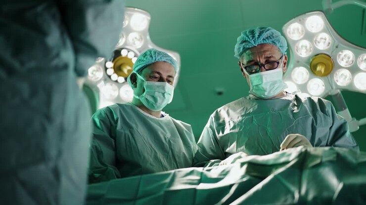 Surgeons performing an operation in the operating room
