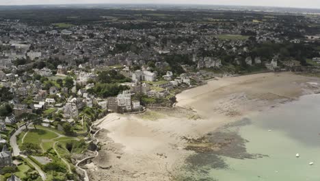 aerial view of coastal town with beach