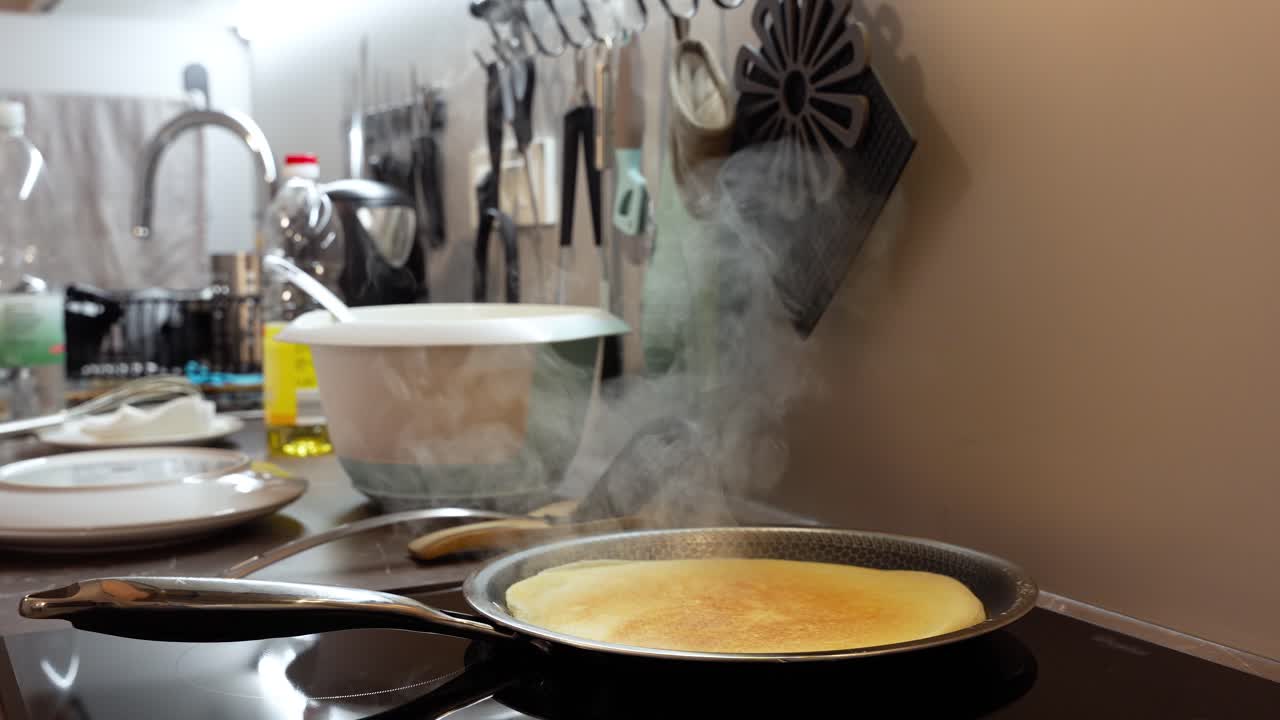 European-Style Pancakes Cooking in a Professional Pancake Frying Pan