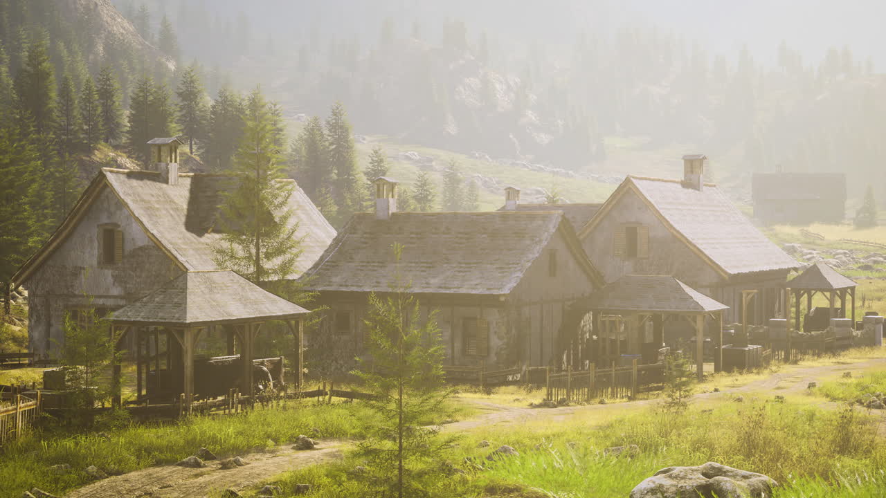 Rustic village surrounded by mountains and green landscapes during daylight