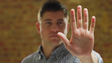 Man-using-interactive-touchscreen