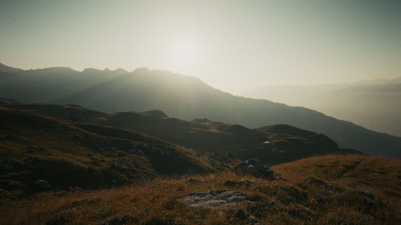 Sunrise Over Alpine Hills