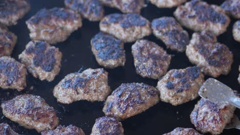 grilled kofta on a hot plate