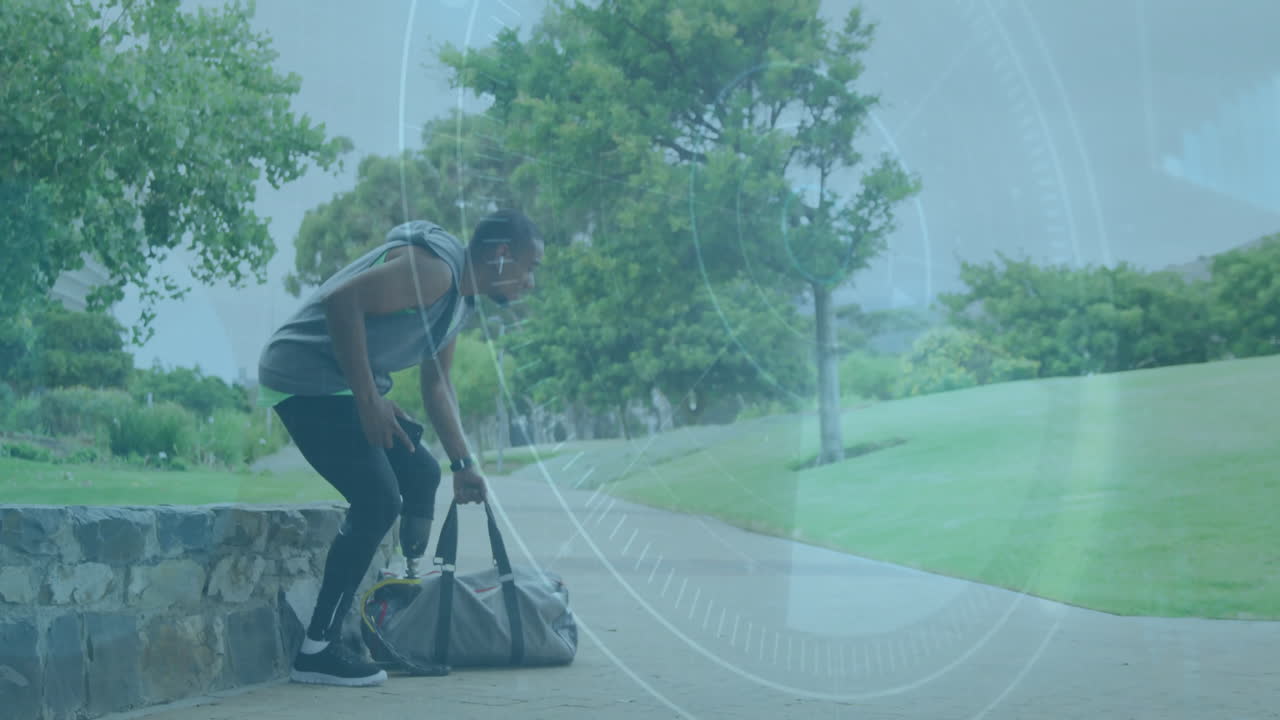 Man in park with gym bag, digital interface animation overlaying scene