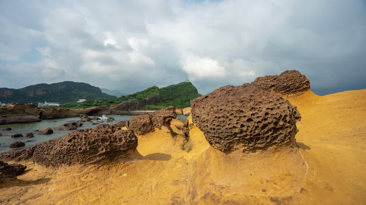 Yehilu Geopark, Taiwan. Time Lapse of Clouds Above Mushroom Shaped Eroded Formation on Coastline