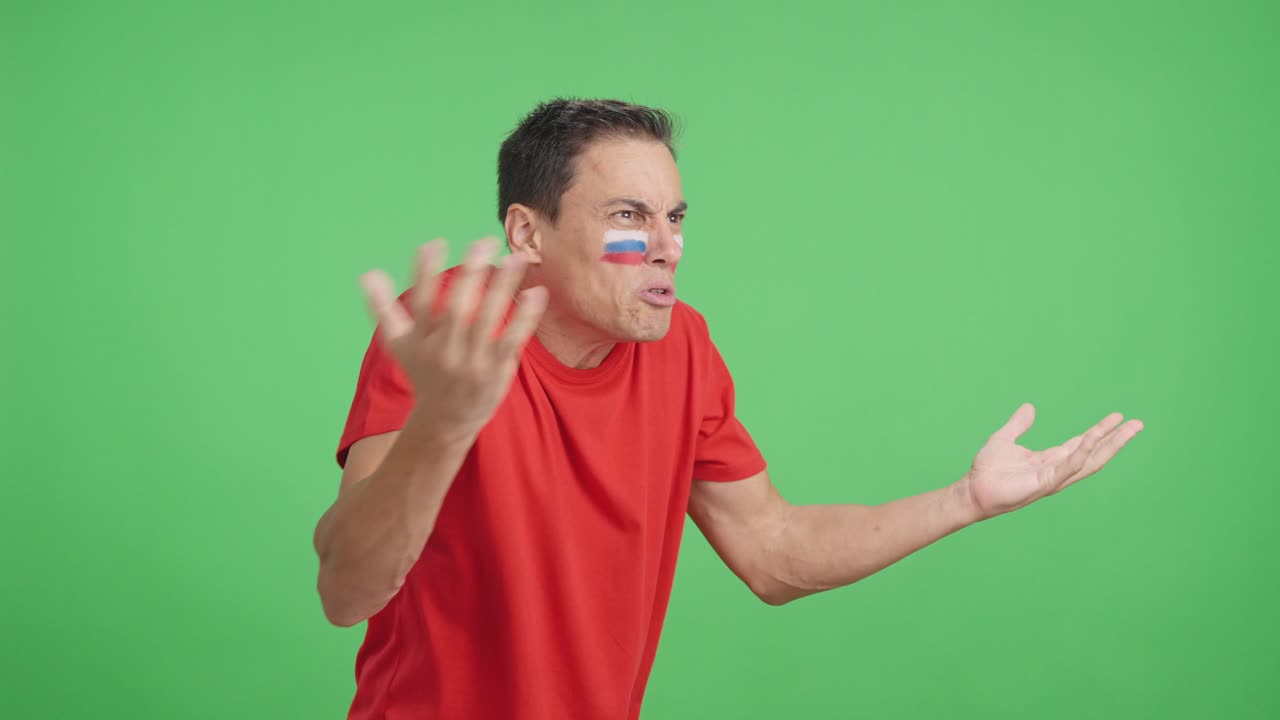 Man cheering for Russia, angry with the decision of referee