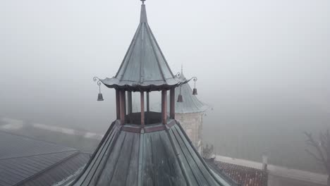 Architectural-details-of-Chateau-Cos-d'Estournel-winery-on-foggy-day,-Bordeaux-region-of-France