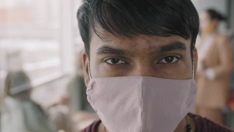close up slowmo of businessman in face mask