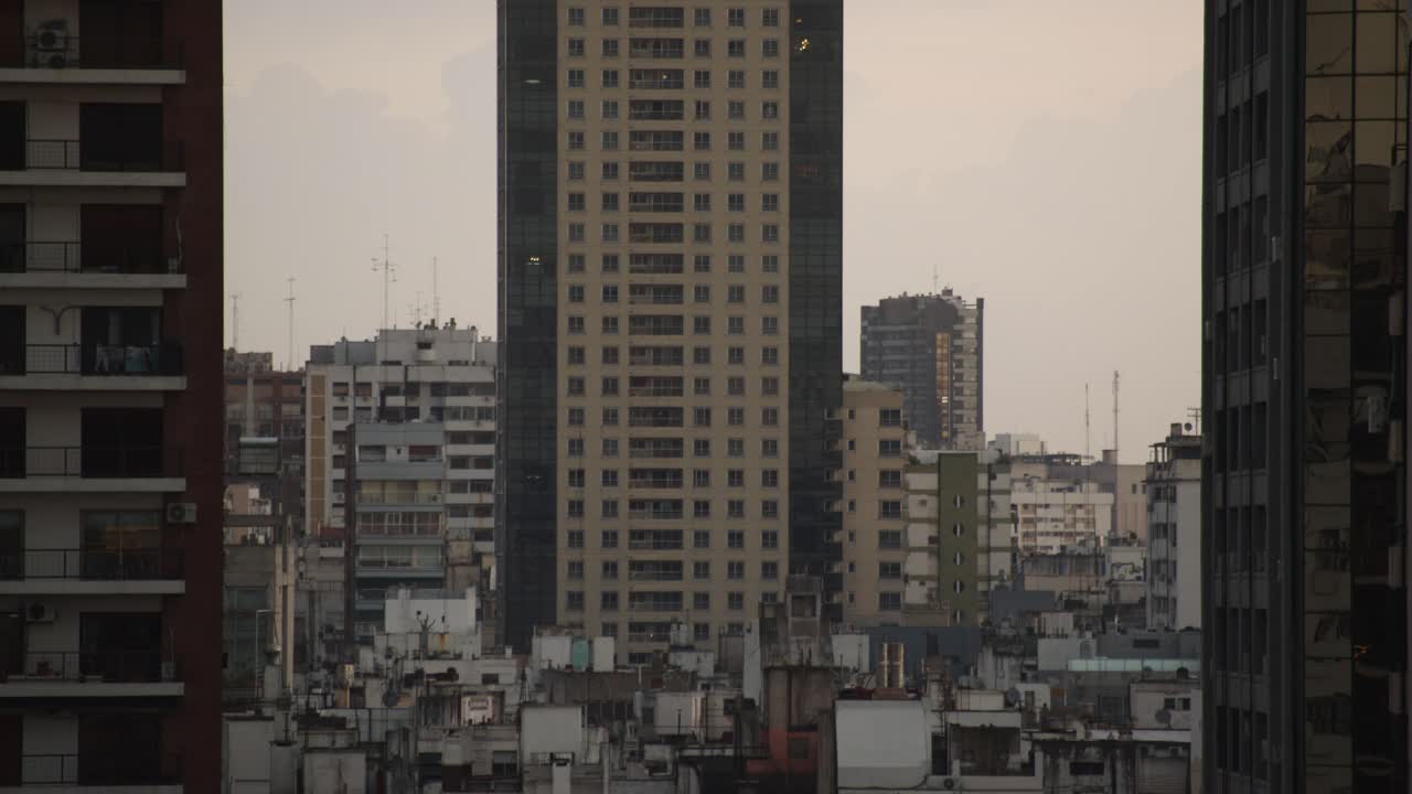 Tall buildings and dense urban landscape in Buenos Aires during a calm, overcast day