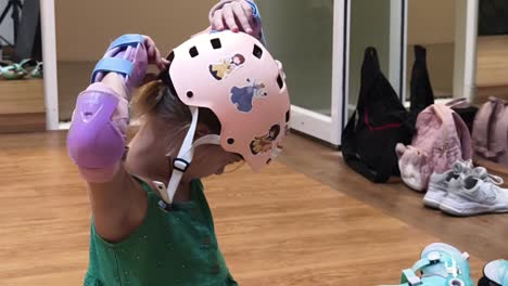 child getting ready to roller skate