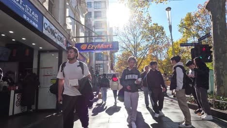 pedestrians walking on a sunny day