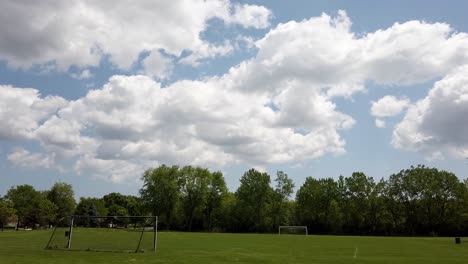 beautiful day, a bright blue sky with some puffy clouds crossing