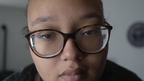 Portrait-close-up-of-a-serious-looking-beautiful-black-woman