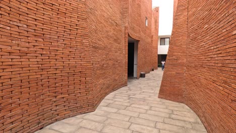 camera moves through a complex brick labyrinth