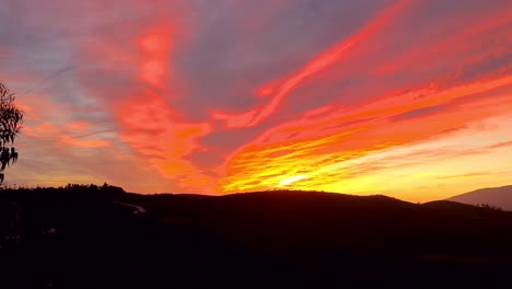 panning footage of a sunset where the sky appears to be on fire