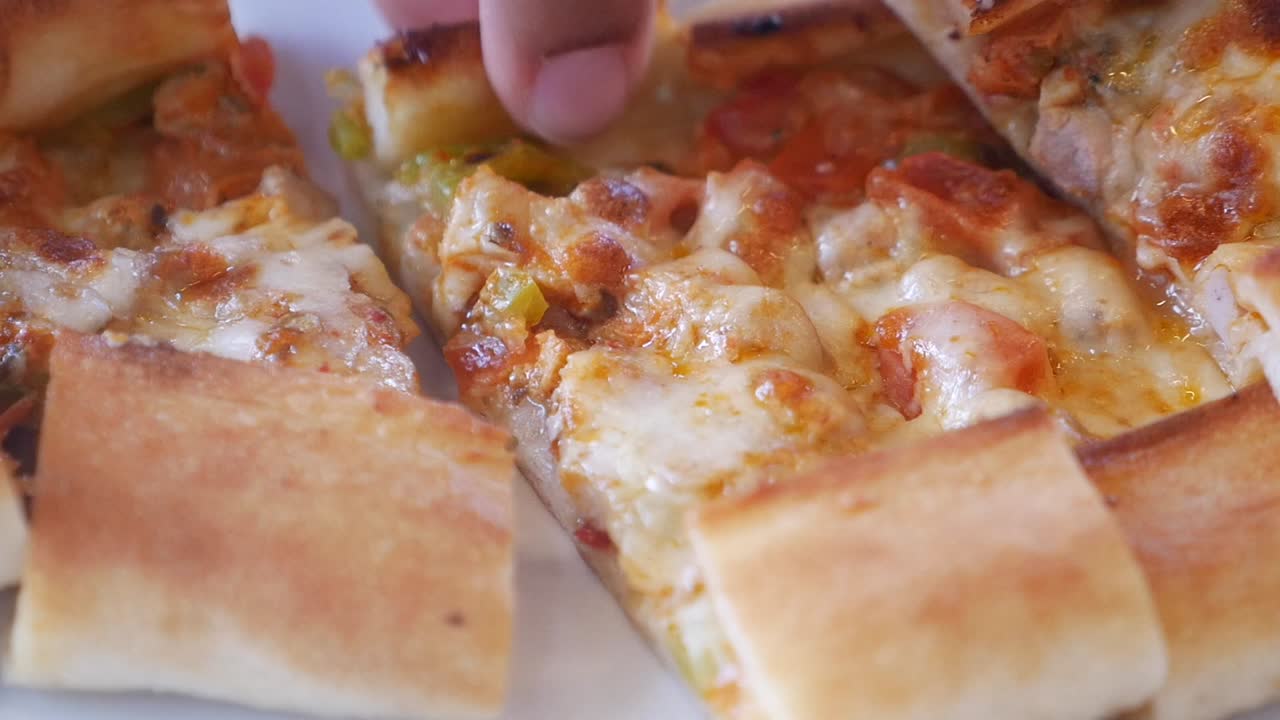 Delicious Turkish pide slices with melted cheese and vegetables
