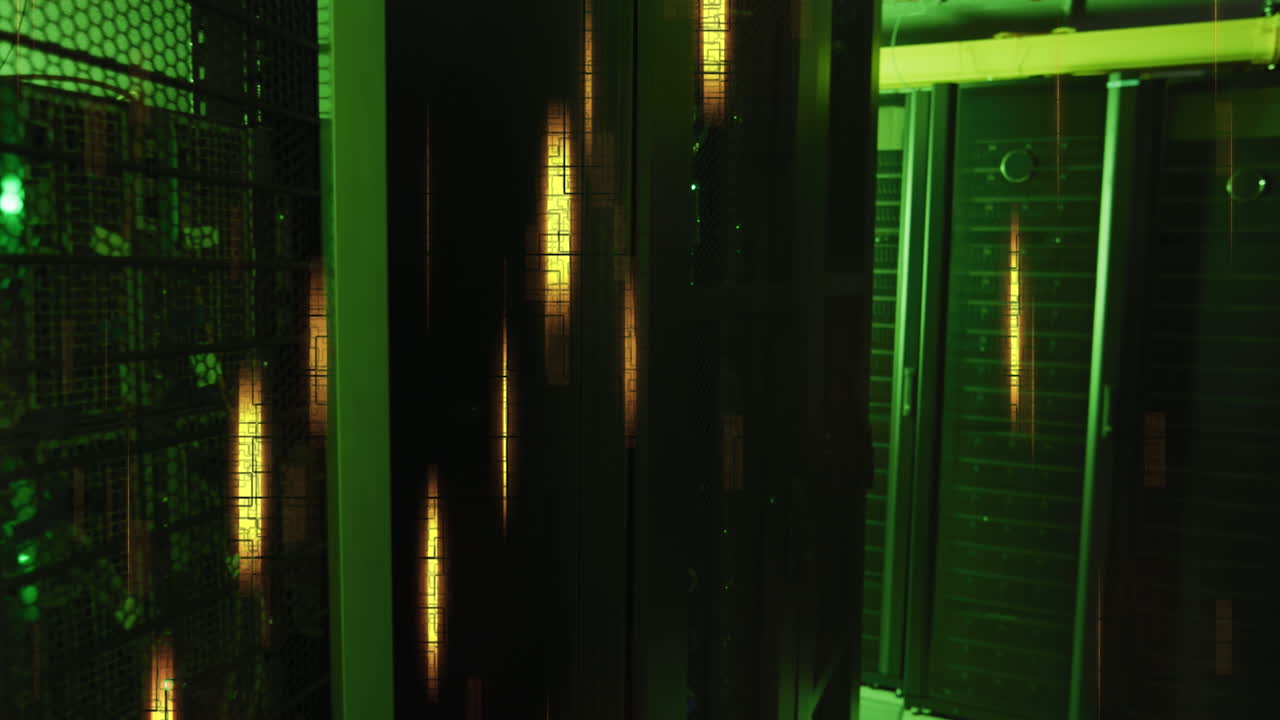 Glowing yellow lights and data processing over green lit, dark computer server room