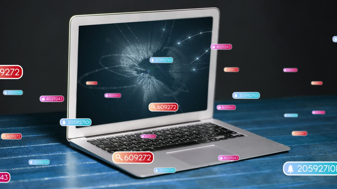 Animation of falling icons over laptop