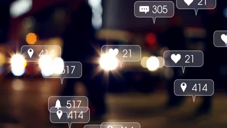 animation of social media icons and numbers over out of focus city and traffic lights