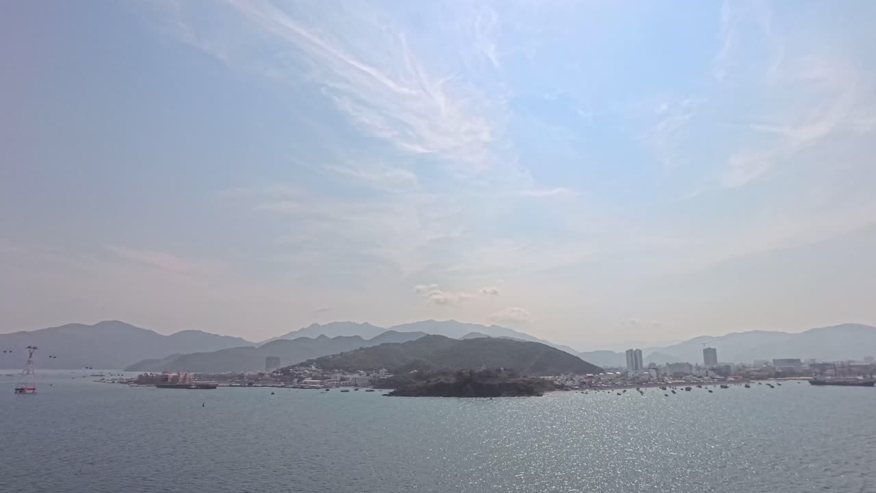 Coastal city and mountains landscape